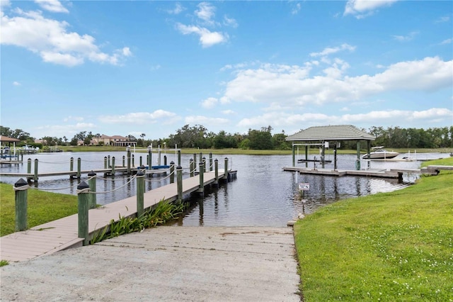 1015 143rd St NE, Bradenton, FL 34212 - dock with a water view and a lawn