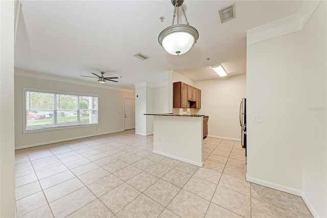 4802 51st St W Unit 808, Bradenton, FL 34210 - kitchen featuring ornamental molding, dark countertops, open floor plan, light tile patterned floors, and a ceiling fan