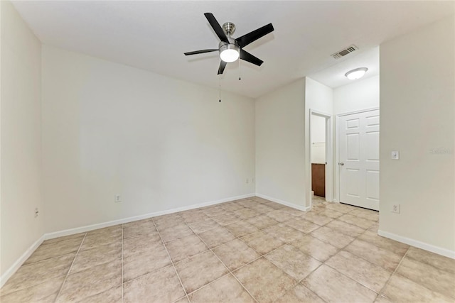 4802 51st St W Unit 808, Bradenton, FL 34210 - spare room with ceiling fan, light tile patterned floors, and baseboards
