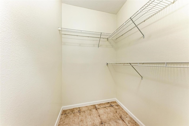 4802 51st St W Unit 808, Bradenton, FL 34210 - walk in closet with light tile patterned flooring