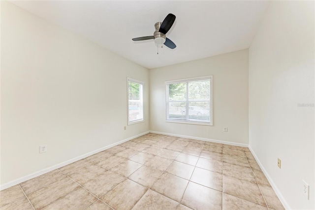 4802 51st St W Unit 808, Bradenton, FL 34210 - unfurnished room featuring a ceiling fan, light tile patterned flooring, and baseboards