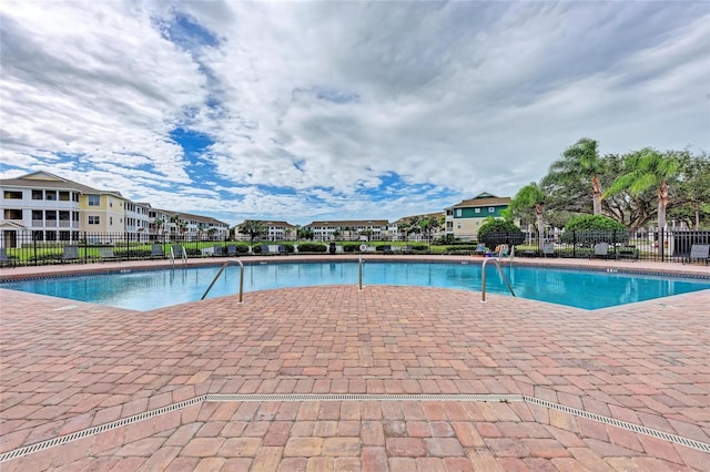 4802 51st St W Unit 808, Bradenton, FL 34210 - community pool featuring a patio area and a residential view