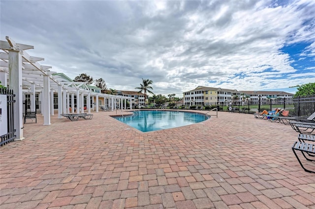 4802 51st St W Unit 808, Bradenton, FL 34210 - community pool with a patio area and a pergola