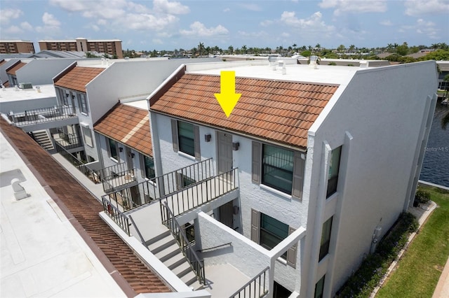4210 SE 20th Pl Unit A8, Cape Coral, FL 33904 - view of property with stairs