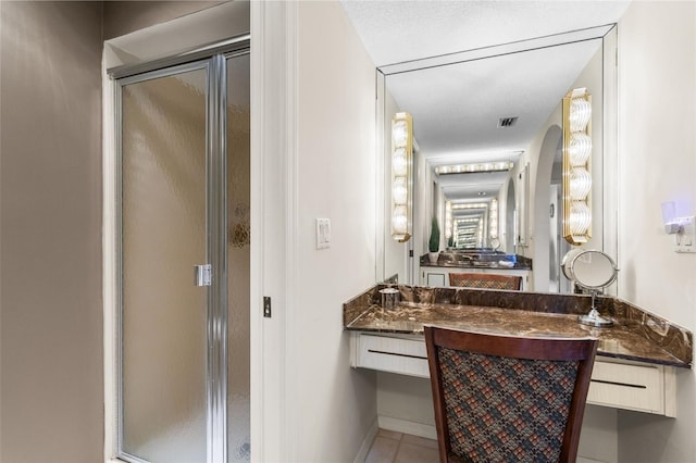 4210 SE 20th Pl Unit A8, Cape Coral, FL 33904 - bathroom with a shower stall, vanity, and tile patterned flooring