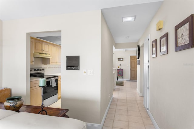 4210 SE 20th Pl Unit A8, Cape Coral, FL 33904 - corridor with light tile patterned floors and baseboards