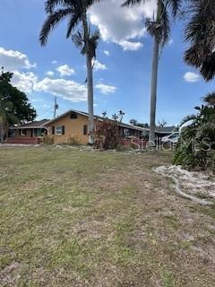 200 San Lorenzo Ave, North Port, FL 34287 - view of green lawn