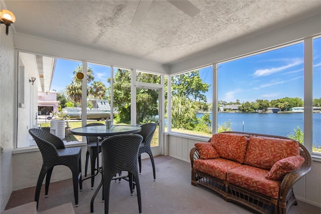 3861 N Ringdove Pt, Crystal River, FL 34428 - sunroom / solarium with a water view, ceiling fan, and outdoor dining space