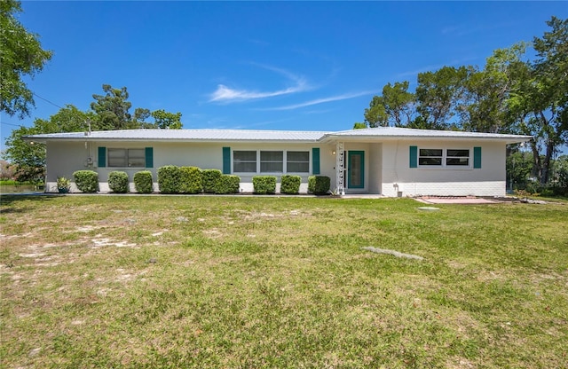 3861 N Ringdove Pt, Crystal River, FL 34428 - single story home featuring a front lawn and metal roof