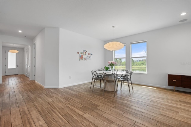 5240 Bentgrass Way, Bradenton, FL 34211 - dining area with light wood-style floors, baseboards, and recessed lighting