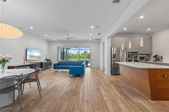5240 Bentgrass Way, Bradenton, FL 34211 - dining space featuring light wood-type flooring and recessed lighting
