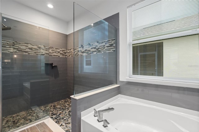 5240 Bentgrass Way, Bradenton, FL 34211 - bathroom with a garden tub, a walk in shower, and recessed lighting