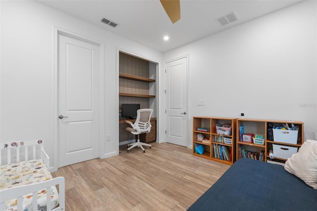 5240 Bentgrass Way, Bradenton, FL 34211 - bedroom with an office area, light wood-type flooring, recessed lighting, and baseboards