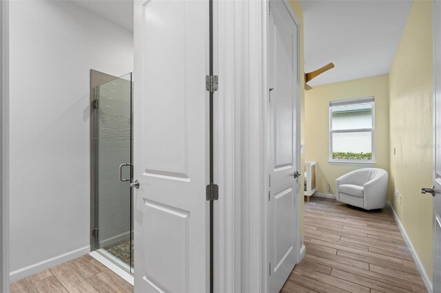 5240 Bentgrass Way, Bradenton, FL 34211 - corridor featuring wood finished floors and baseboards