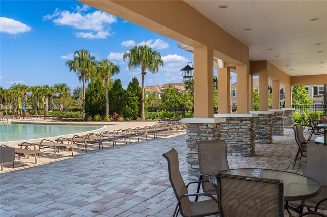 5240 Bentgrass Way, Bradenton, FL 34211 - view of patio featuring a community pool