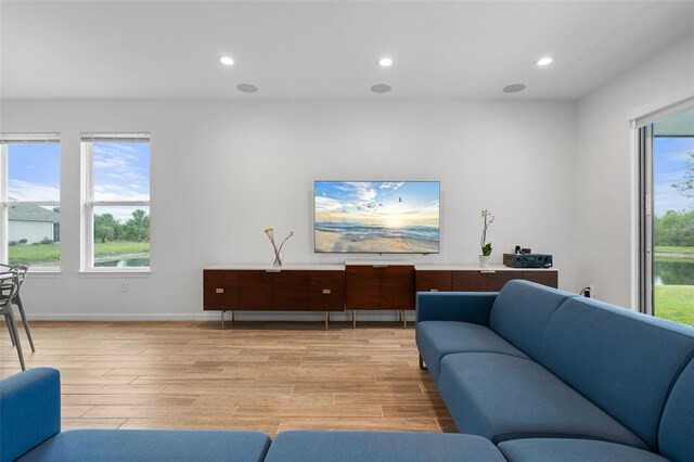 5240 Bentgrass Way, Bradenton, FL 34211 - living area featuring light wood-style floors, recessed lighting, and baseboards