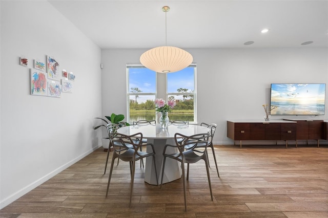 5240 Bentgrass Way, Bradenton, FL 34211 - dining area featuring wood finished floors, baseboards, and recessed lighting