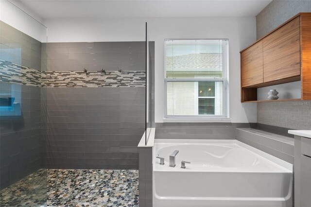5240 Bentgrass Way, Bradenton, FL 34211 - full bathroom featuring a bath, tiled shower, and vanity
