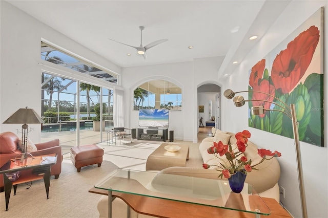 7214 Marlow Pl, University Park, FL 34201 - living area featuring arched walkways, recessed lighting, a ceiling fan, and carpet