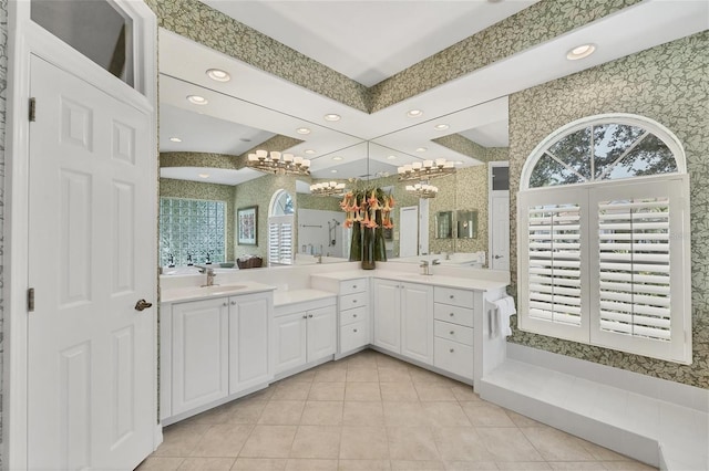 7214 Marlow Pl, University Park, FL 34201 - bathroom featuring a chandelier, double vanity, recessed lighting, plenty of natural light, and tile patterned floors