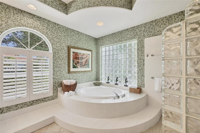 7214 Marlow Pl, University Park, FL 34201 - bathroom with a garden tub, tile patterned floors, tiled shower, and wallpapered walls