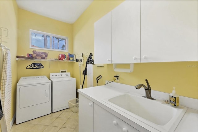 7214 Marlow Pl, University Park, FL 34201 - washroom featuring washing machine and clothes dryer, cabinet space, and light tile patterned floors