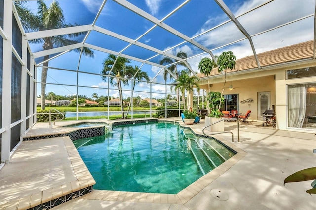 7214 Marlow Pl, University Park, FL 34201 - view of swimming pool with a patio area, a ceiling fan, a pool with connected hot tub, a water view, and glass enclosure