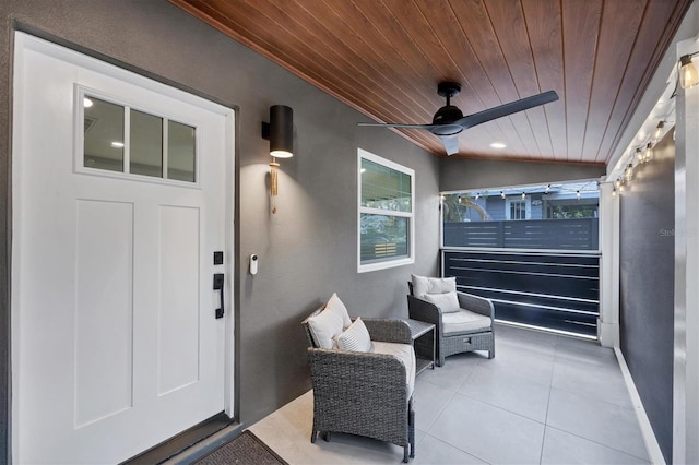 1919 Laurel St, Sarasota, FL 34236 - view of exterior entry with stucco siding and ceiling fan