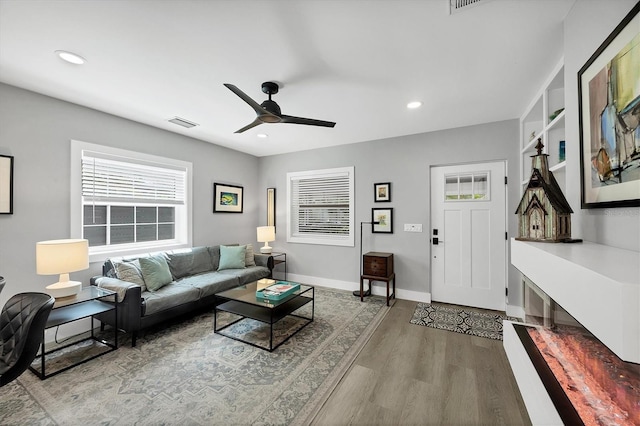 1919 Laurel St, Sarasota, FL 34236 - living area featuring wood finished floors, a ceiling fan, and recessed lighting