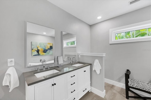 1919 Laurel St, Sarasota, FL 34236 - full bath featuring wood finished floors and double vanity