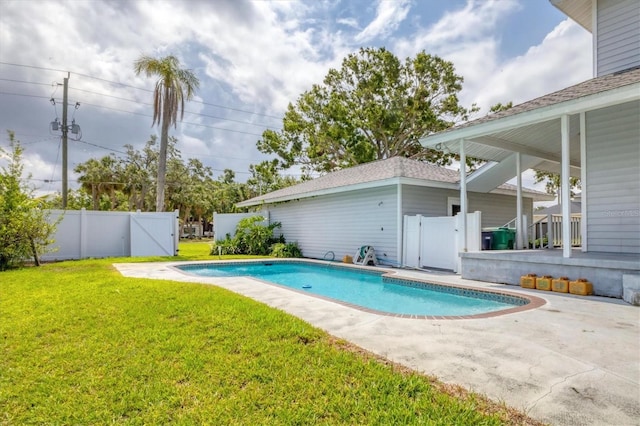 2002 8th St W, Palmetto, FL 34221 - view of swimming pool featuring a patio area and a gate