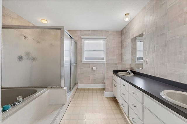 2002 8th St W, Palmetto, FL 34221 - full bath with double vanity, a stall shower, a bath, and healthy amount of natural light