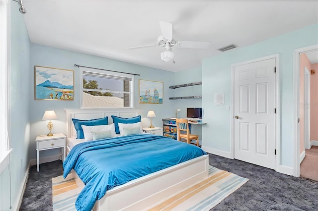 2002 8th St W, Palmetto, FL 34221 - bedroom featuring baseboards, carpet flooring, and a ceiling fan