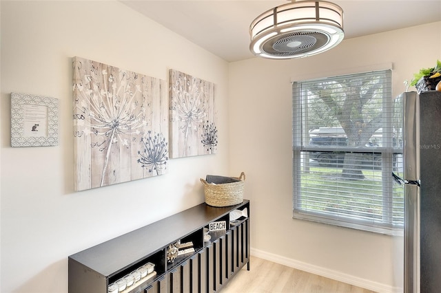 6024 28th St W, Bradenton, FL 34207 - hall with healthy amount of natural light and wood finished floors