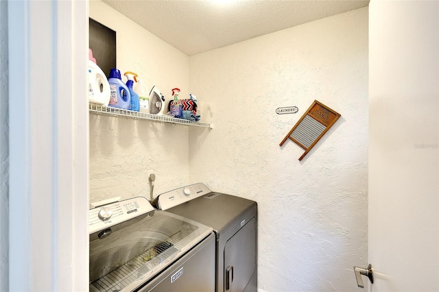 6024 28th St W, Bradenton, FL 34207 - washroom featuring washing machine and clothes dryer and a textured wall