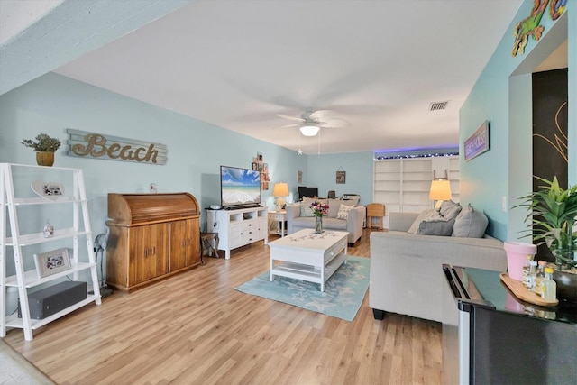 2740 Orchid Oaks Dr Unit 304, Sarasota, FL 34239 - living room featuring ceiling fan and wood finished floors