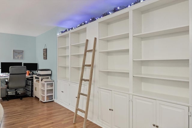 2740 Orchid Oaks Dr Unit 304, Sarasota, FL 34239 - home office featuring light wood-type flooring