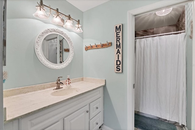 2740 Orchid Oaks Dr Unit 304, Sarasota, FL 34239 - full bath featuring vanity and curtained shower
