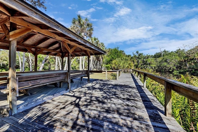 2740 Orchid Oaks Dr Unit 304, Sarasota, FL 34239 - wooden deck with a gazebo