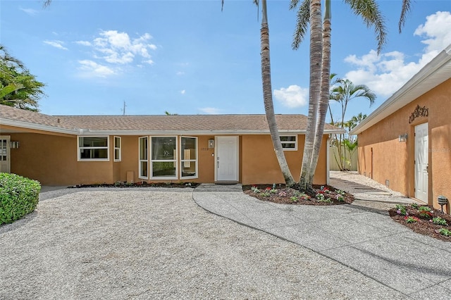 1203 Lyric Ln, Sarasota, FL 34242 - view of front of property featuring stucco siding