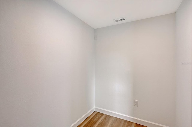1203 Lyric Ln, Sarasota, FL 34242 - unfurnished room featuring baseboards and light wood-style flooring