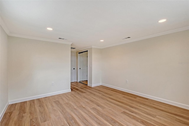 1203 Lyric Ln, Sarasota, FL 34242 - empty room featuring recessed lighting, light wood-type flooring, and ornamental molding