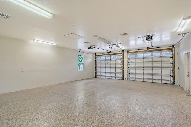 1203 Lyric Ln, Sarasota, FL 34242 - garage featuring a garage door opener