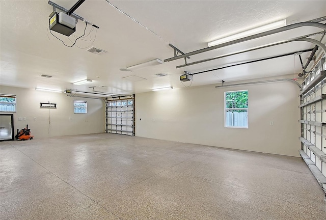1203 Lyric Ln, Sarasota, FL 34242 - garage featuring a garage door opener