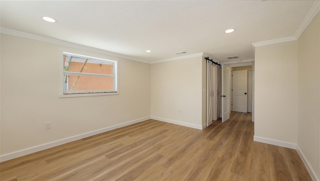 1203 Lyric Ln, Sarasota, FL 34242 - empty room with light wood finished floors, ornamental molding, and recessed lighting
