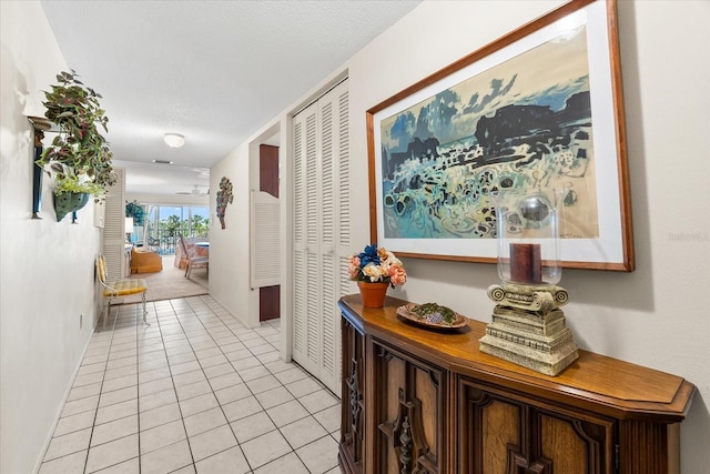 5600 Beach Way Dr Unit 201, Sarasota, FL 34242 - hall with light tile patterned floors