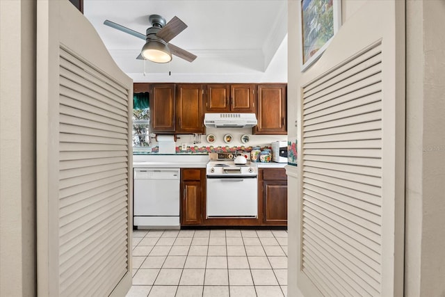 5600 Beach Way Dr Unit 201, Sarasota, FL 34242 - kitchen featuring white appliances, under cabinet range hood, light tile patterned floors, light countertops, and ceiling fan