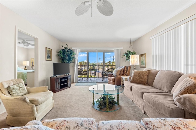 5600 Beach Way Dr Unit 201, Sarasota, FL 34242 - living room with a ceiling fan and carpet