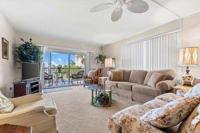 5600 Beach Way Dr Unit 201, Sarasota, FL 34242 - carpeted living area with ceiling fan