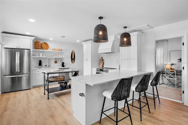 404 Bayshore Rd, Nokomis, FL 34275 - kitchen featuring appliances with stainless steel finishes, custom range hood, open shelves, white cabinetry, and recessed lighting